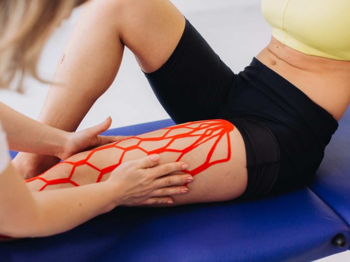 kinesiology tape for quad support, help with pain